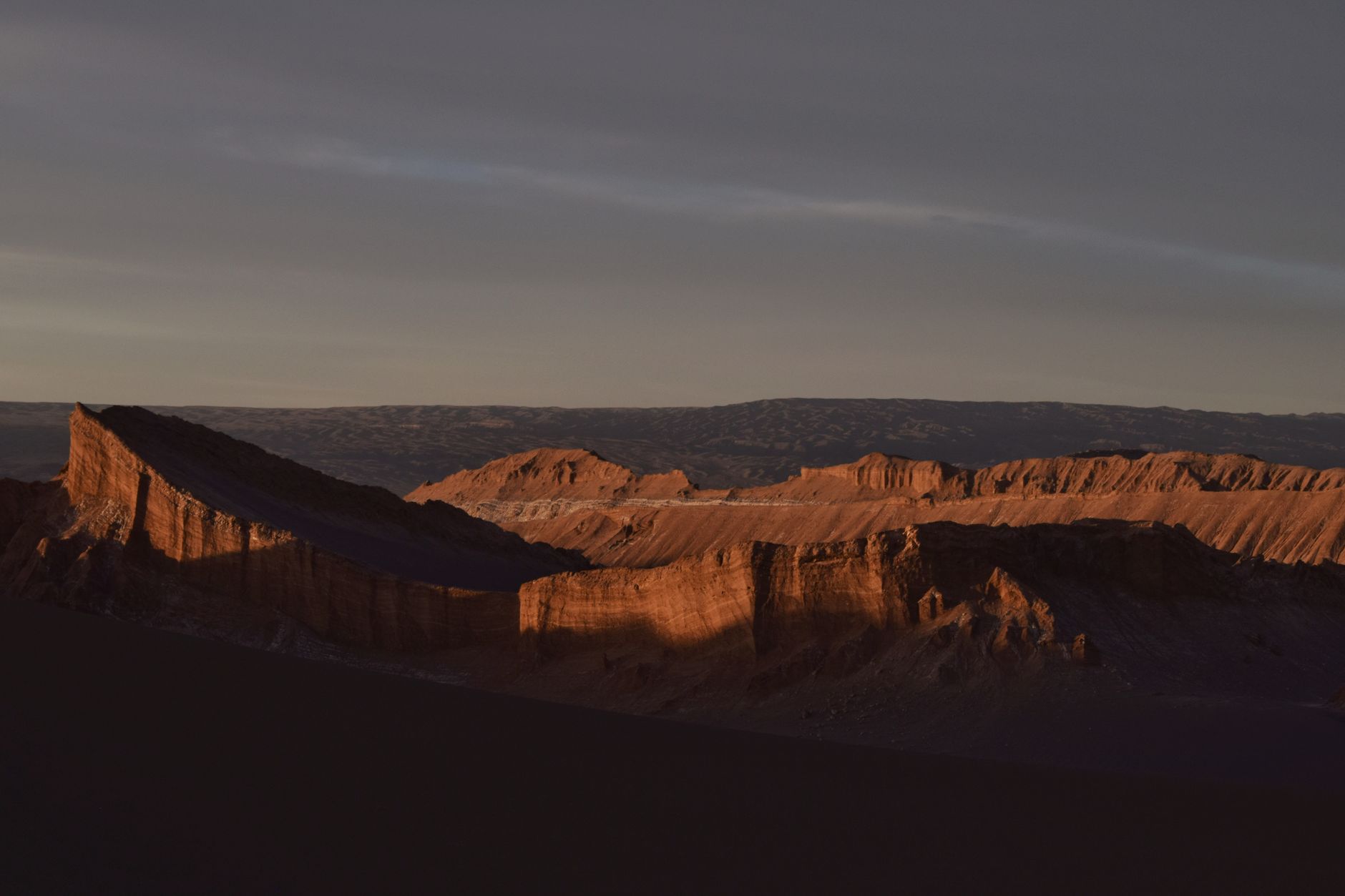 Vast arid landscape of Atacama desert at twilight